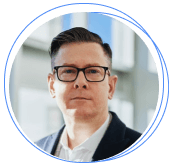 Businessman with glasses in office setting