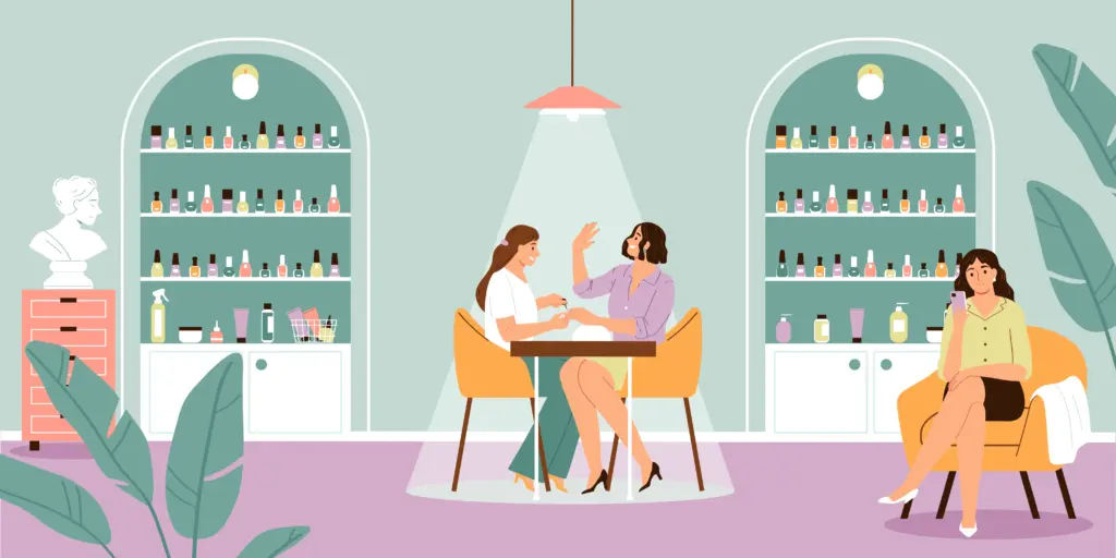 Manicurist painting client's nails in modern salon